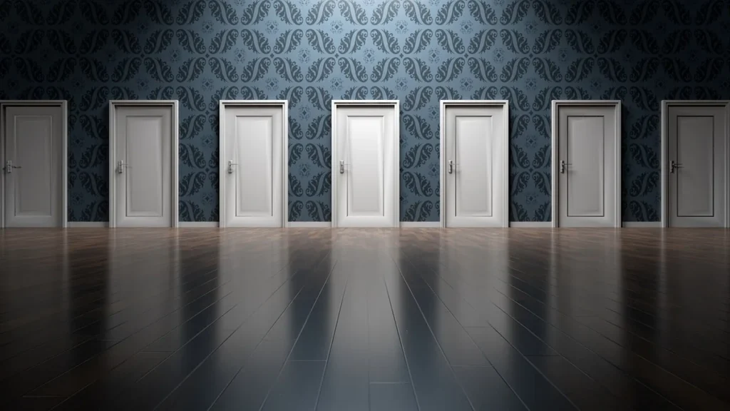 A row of seven white doors set against a blue patterned wallpaper on a dark wooden floor.
