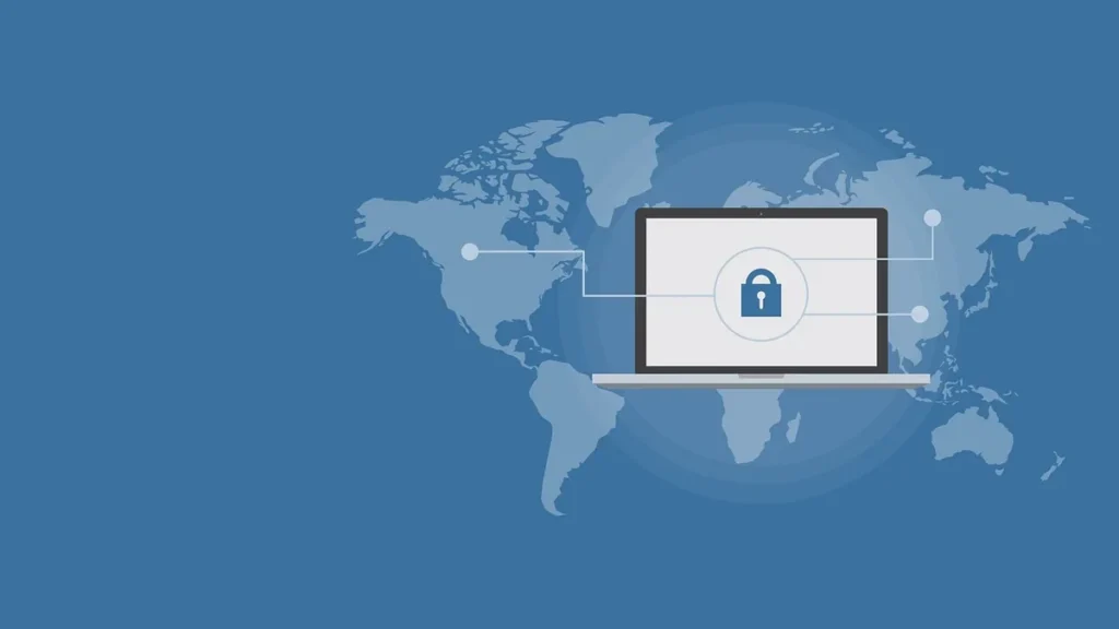 Laptop showing a padlock icon over a blue world map with global network connection lines.