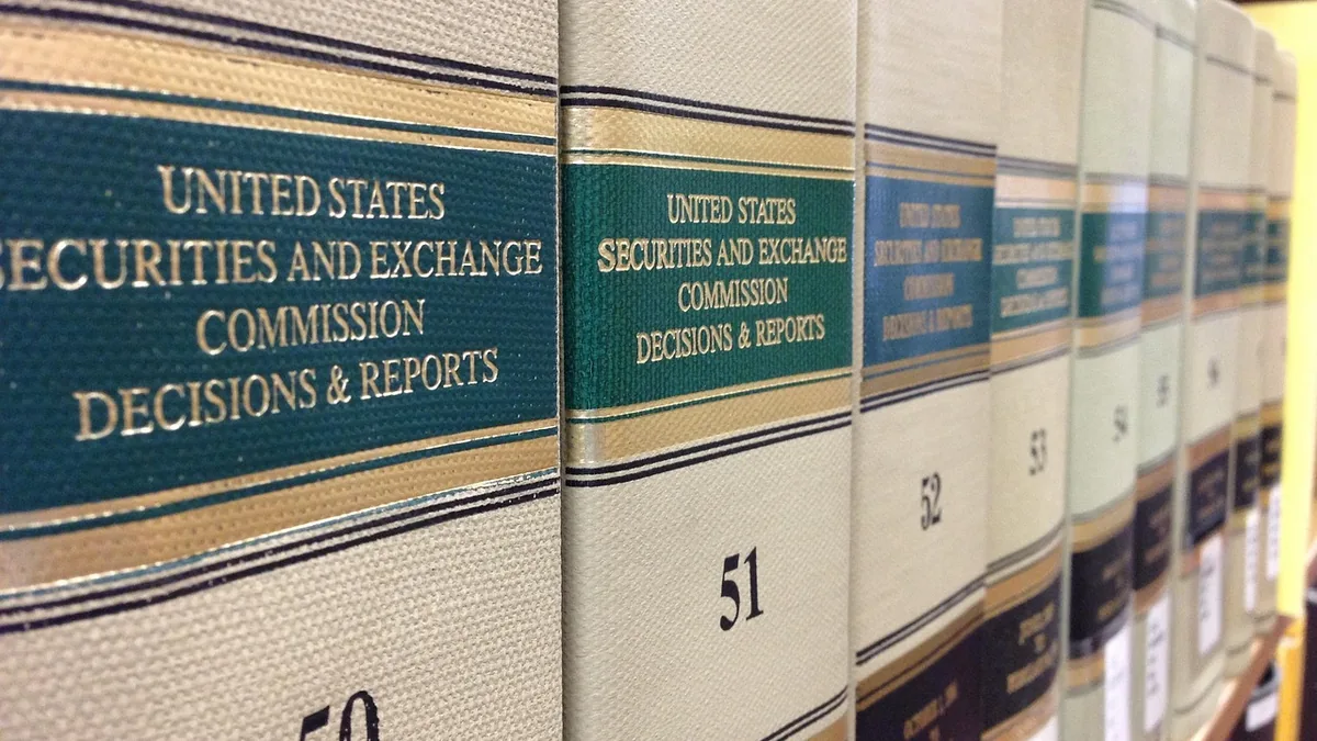 Close-up of leather-bound volumes of United States Securities and Exchange Commission Decisions & Reports lined up on a