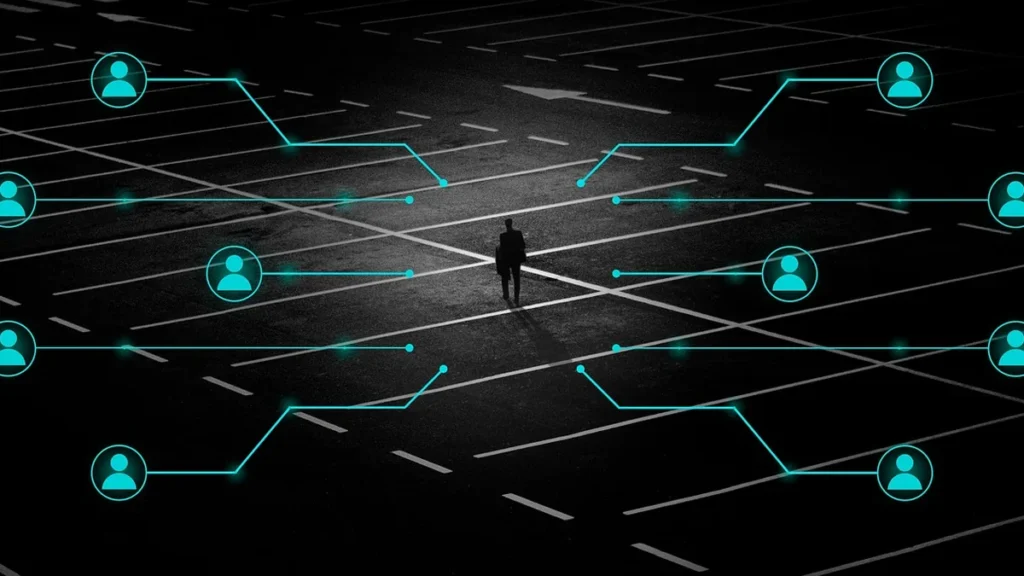 Silhouette of a person surrounded by glowing cyan network lines and user icons on a dark grid.