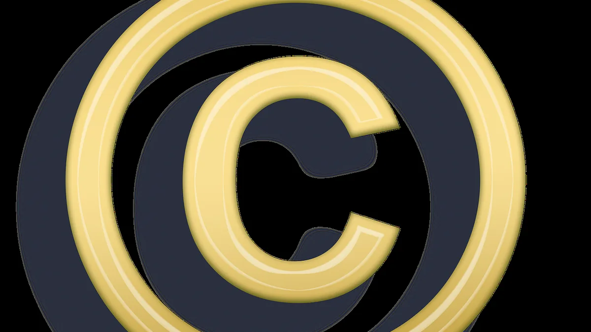 A stylized golden letter C nested within circular bands against a dark blue background.