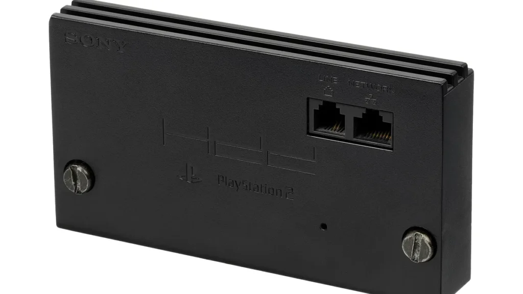 Black Sony PlayStation 2 network adapter showing network and line ports.